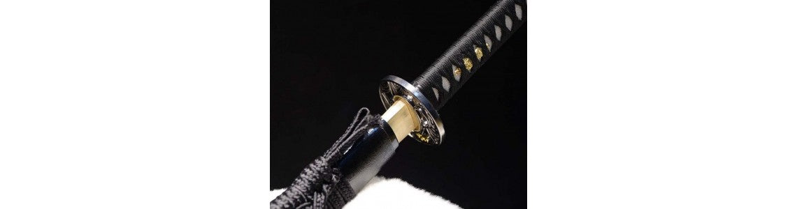 a katana with a black tsuka